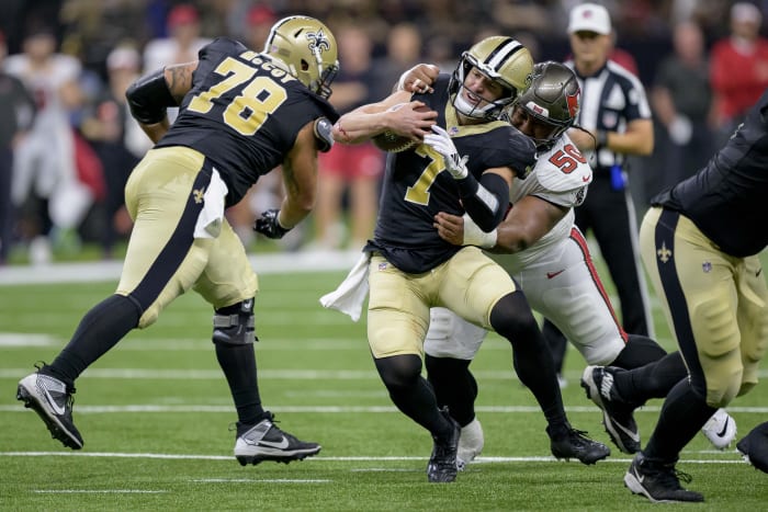 Taysom Hill (7) of the New Orleans Saints is tackled by Tampa Bay Buccaneers defensive tackle Vita Vea (50). Mandatory Credit: Matthew Hinton-USA TODAY